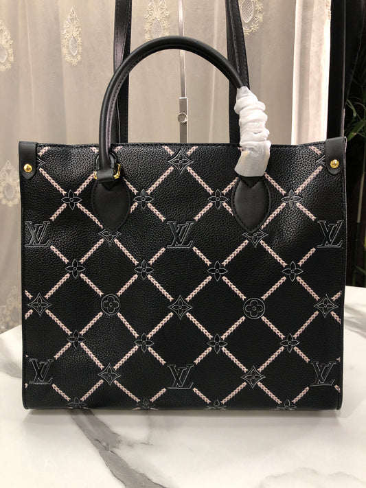Louis Vuitton Monogram Empreinte Broderies OnTheGo MM tote bag