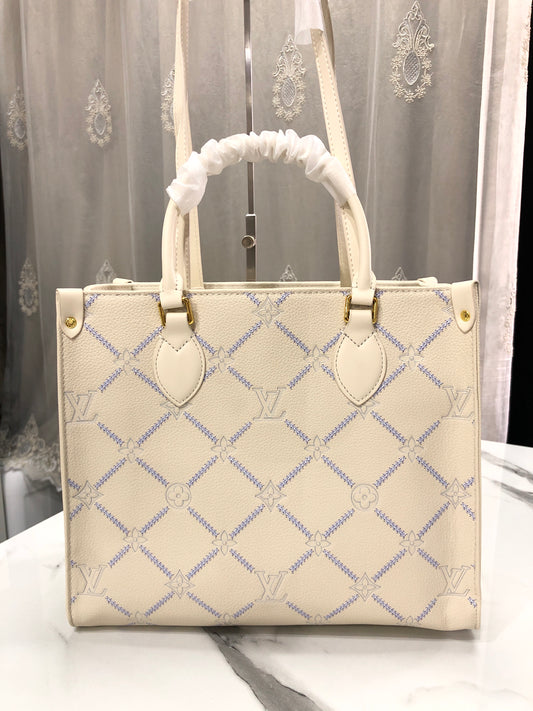 Louis Vuitton Monogram Empreinte Broderies OnTheGo MM tote bag