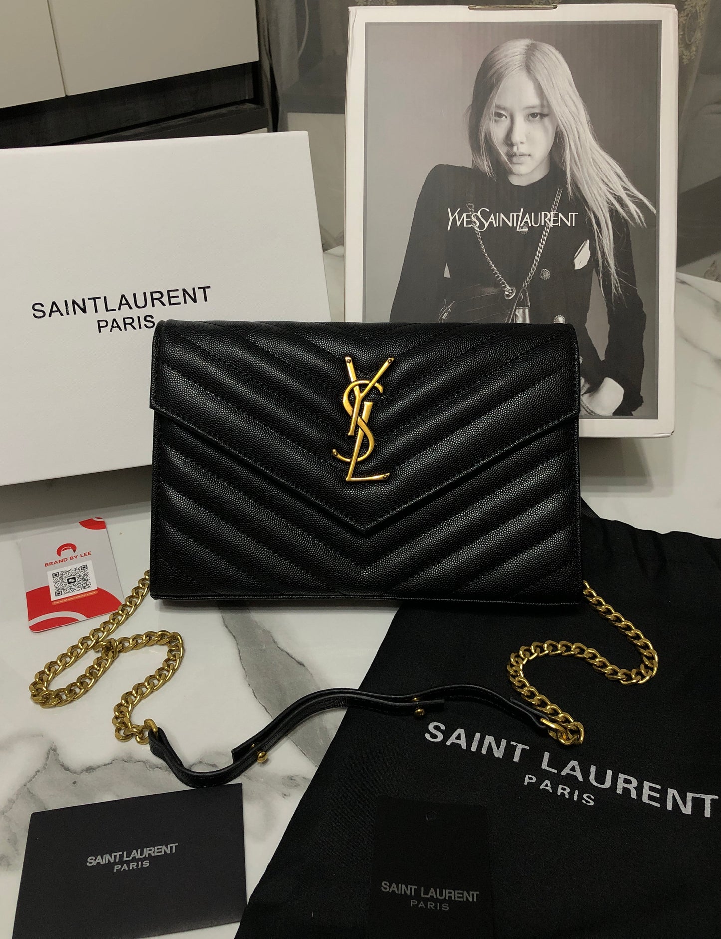 Yves Saint Laurent Black and Gold Chevron Quilted Clutch