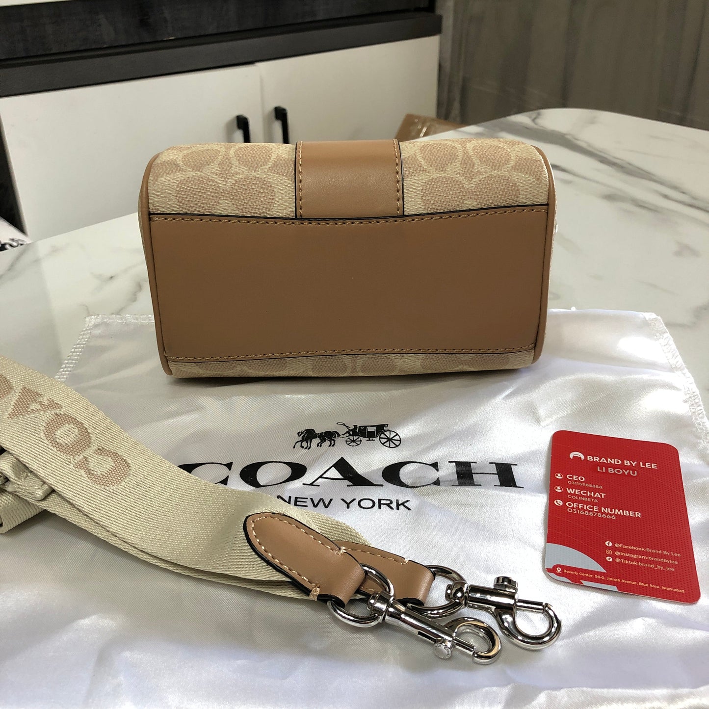 Coach Mini Rowan Crossbody Bag