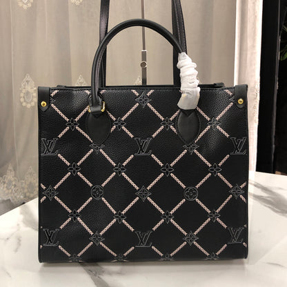 Louis Vuitton Monogram Empreinte Broderies OnTheGo MM tote bag