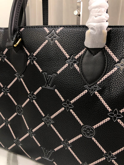 Louis Vuitton Monogram Empreinte Broderies OnTheGo MM tote bag