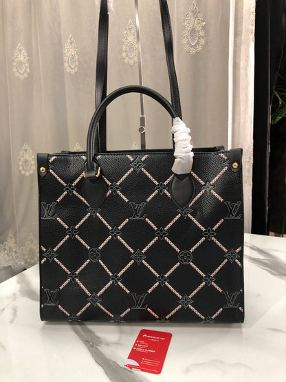 Louis Vuitton Monogram Empreinte Broderies OnTheGo MM tote bag