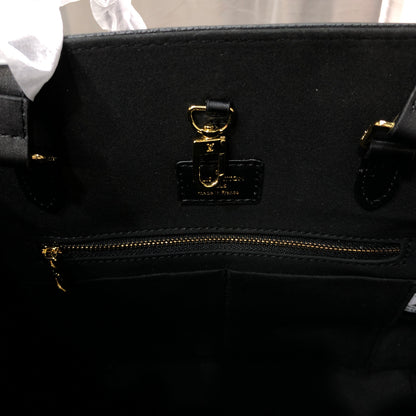 Louis Vuitton Monogram Empreinte Broderies OnTheGo MM tote bag