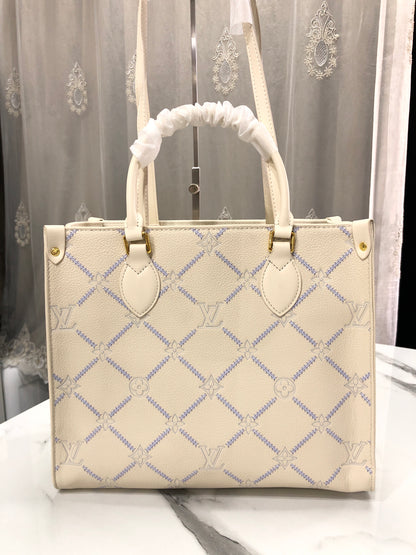 Louis Vuitton Monogram Empreinte Broderies OnTheGo MM tote bag