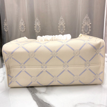 Louis Vuitton Monogram Empreinte Broderies OnTheGo MM tote bag