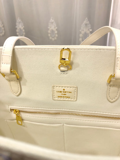 Louis Vuitton Monogram Empreinte Broderies OnTheGo MM tote bag