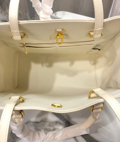 Louis Vuitton Monogram Empreinte Broderies OnTheGo MM tote bag