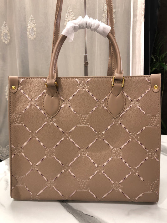 Louis Vuitton Monogram Empreinte Broderies OnTheGo MM tote bag