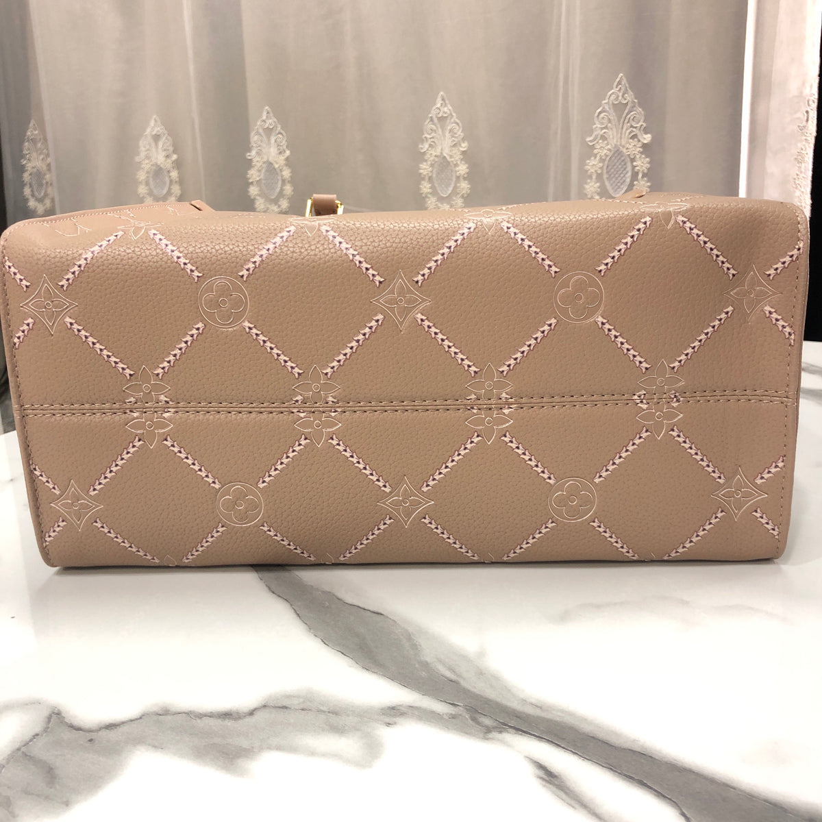 Louis Vuitton Monogram Empreinte Broderies OnTheGo MM tote bag