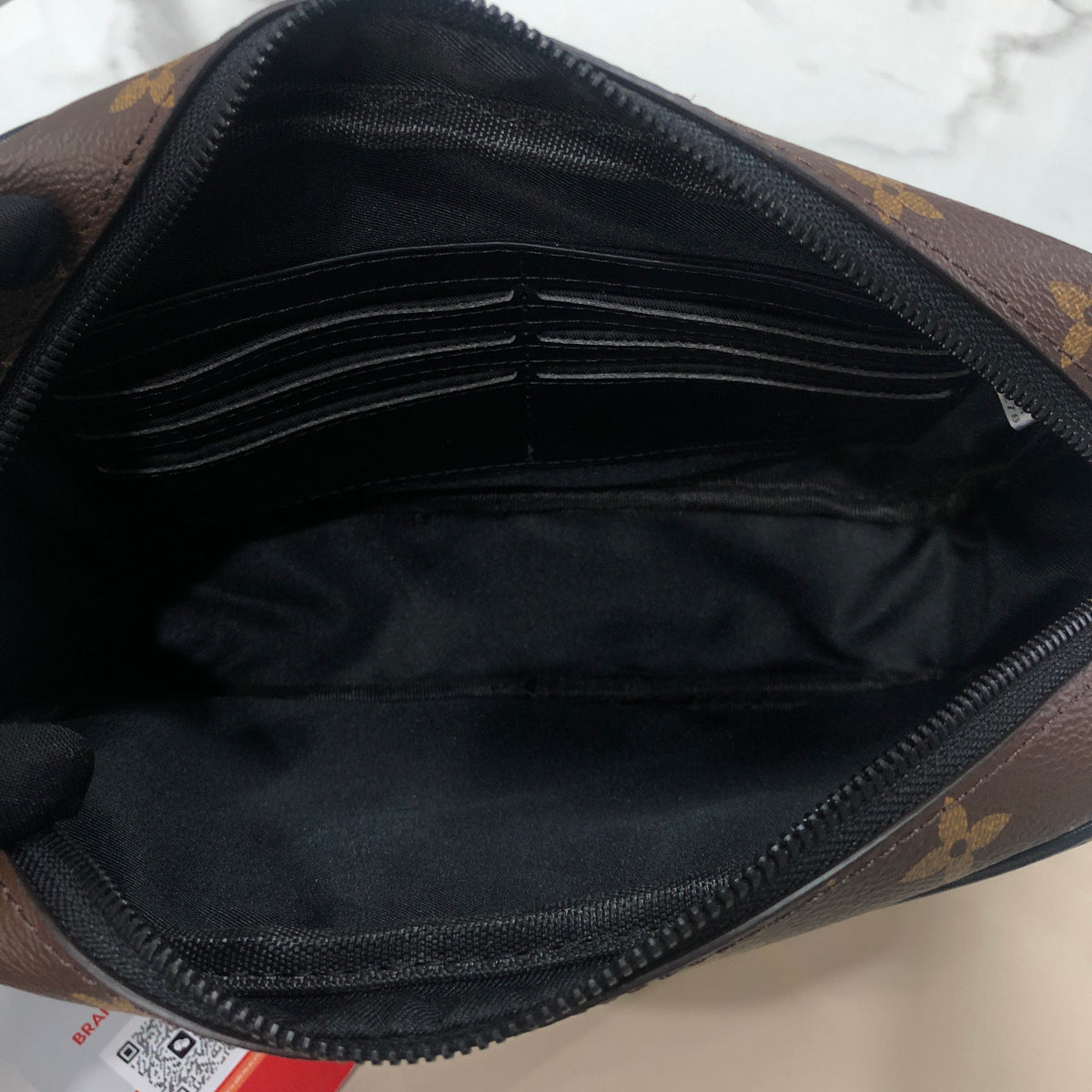 Louis Vuitton Monogram Macassar Kasai clutch