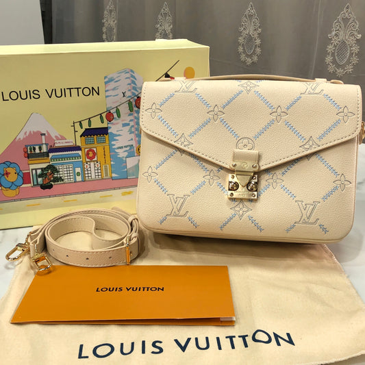Louis Vuitton Pochette Métis MM in Monogram Empreinte Couture