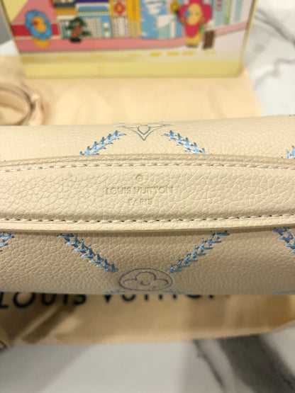 Louis Vuitton Pochette Métis MM in Monogram Empreinte Couture