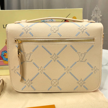 Louis Vuitton Pochette Métis MM in Monogram Empreinte Couture