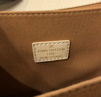 Louis Vuitton Pochette Métis MM in Monogram Empreinte Couture