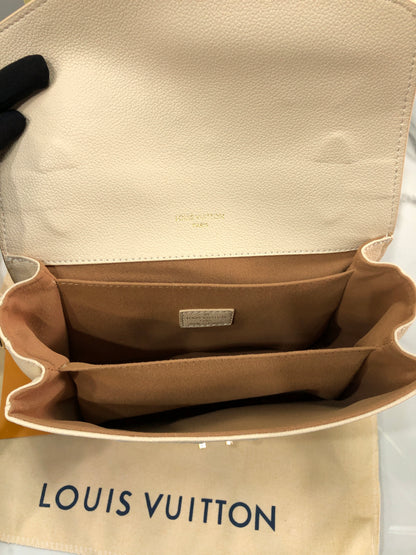 Louis Vuitton Pochette Métis MM in Monogram Empreinte Couture