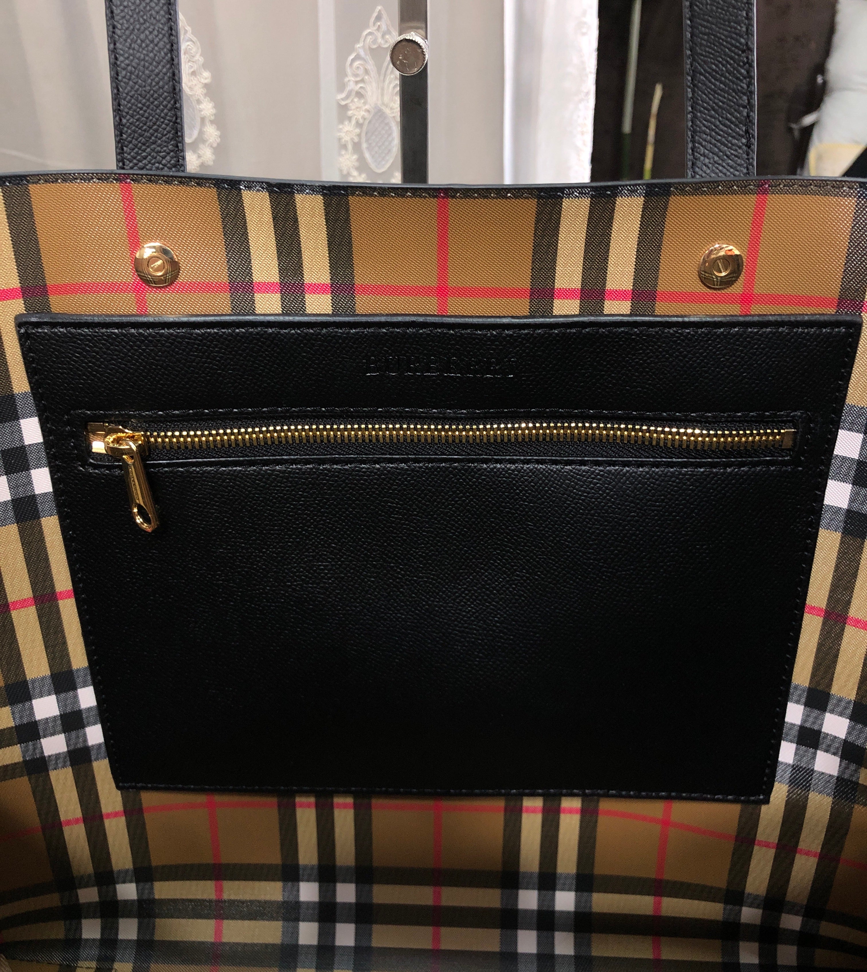Burberry Embossed Crest Leather Tote Bag