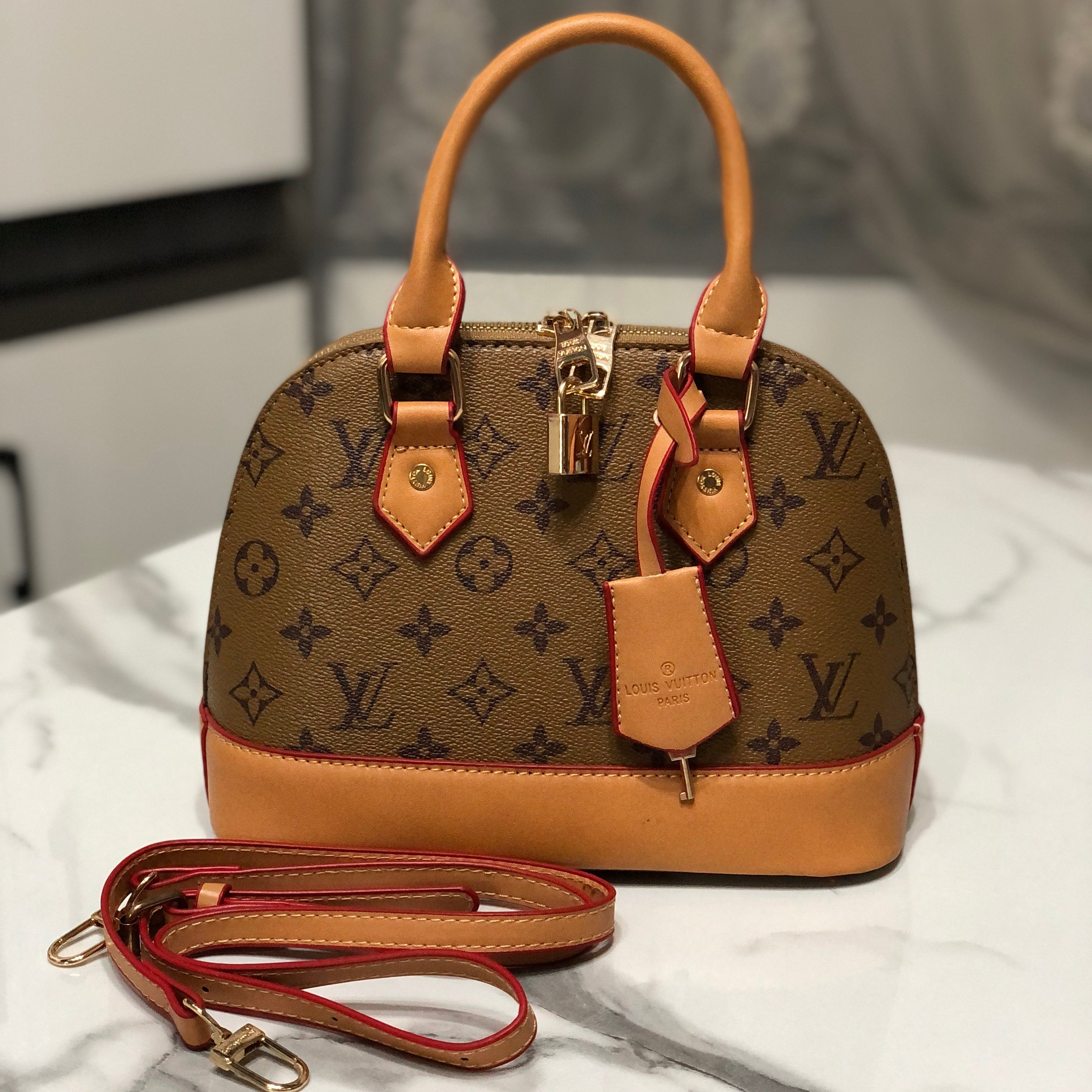 Louis Vuitton Alma Handbag