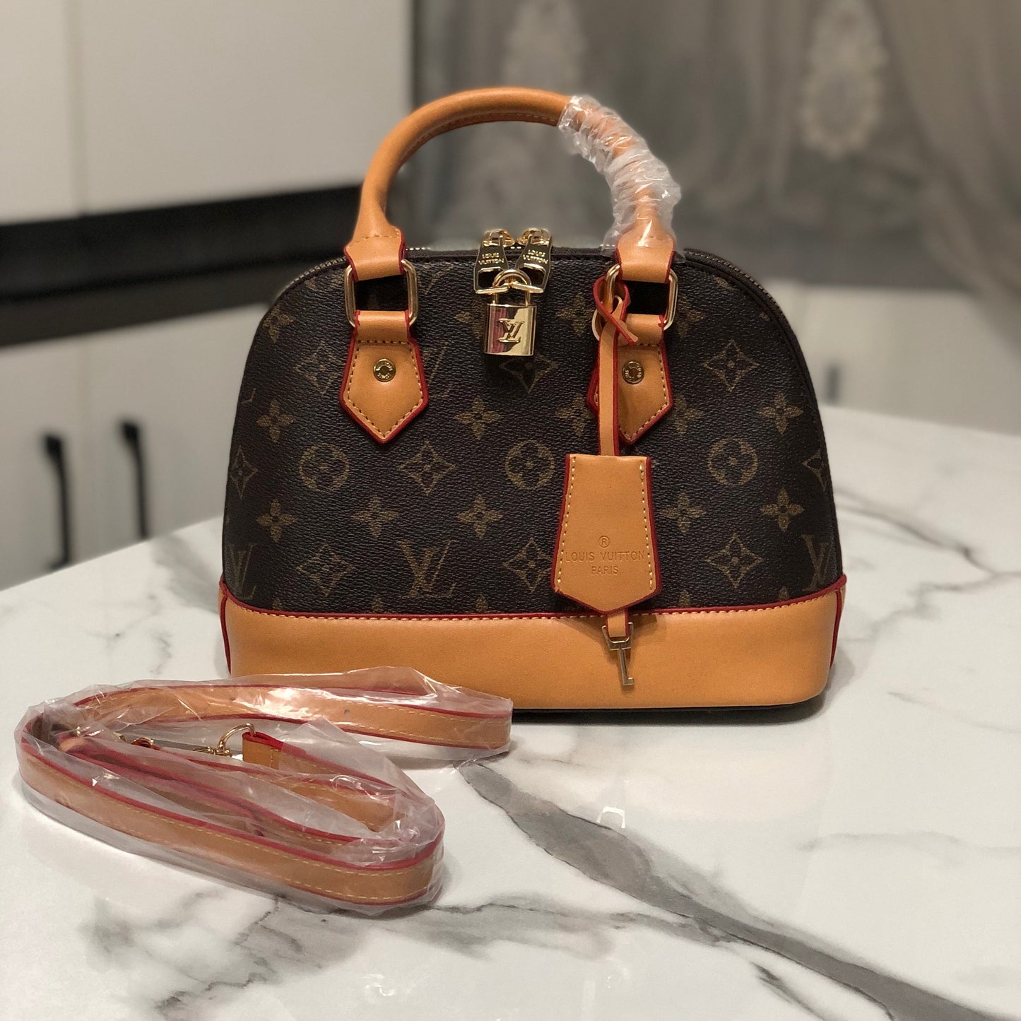 Louis Vuitton Alma Handbag