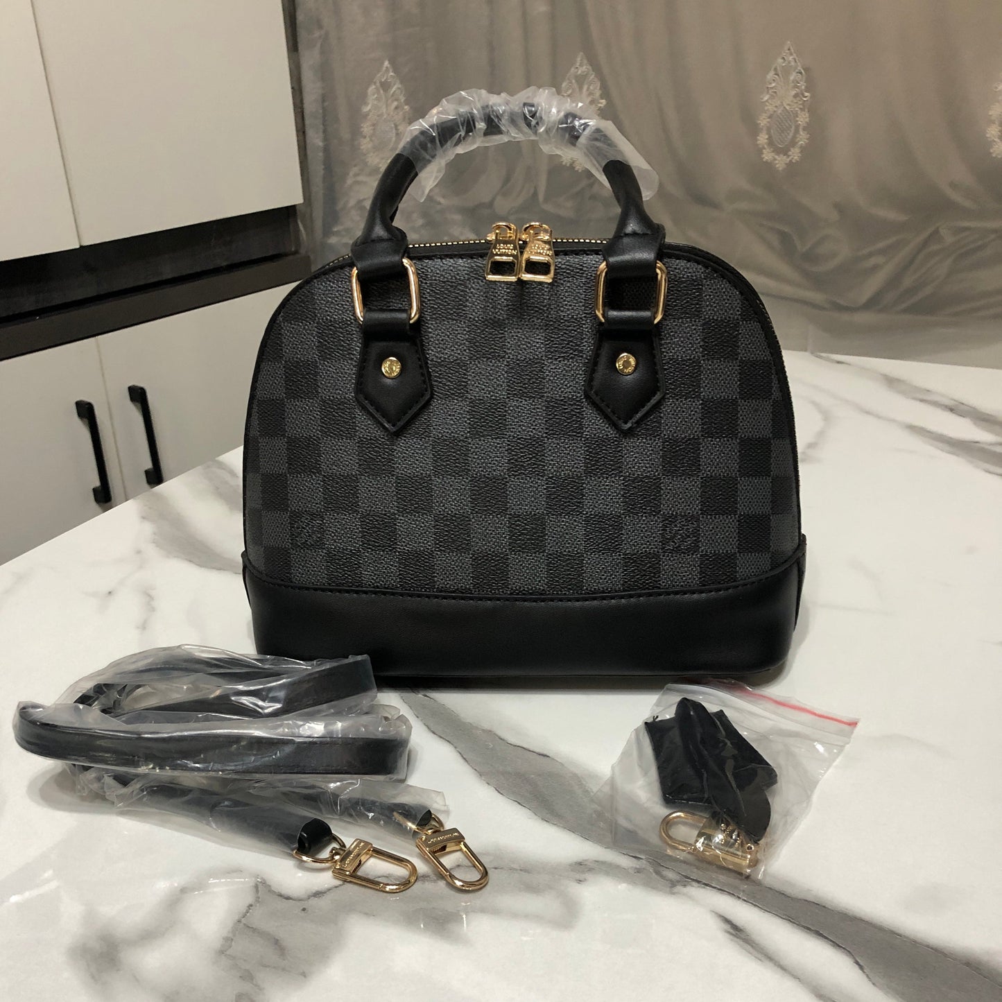 Louis Vuitton Alma Handbag