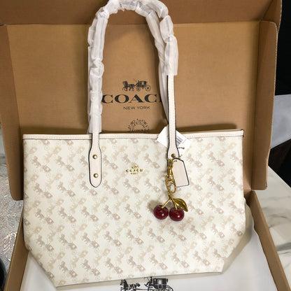 Coach City Zip Tote Bag with Horse and Carriage pattern