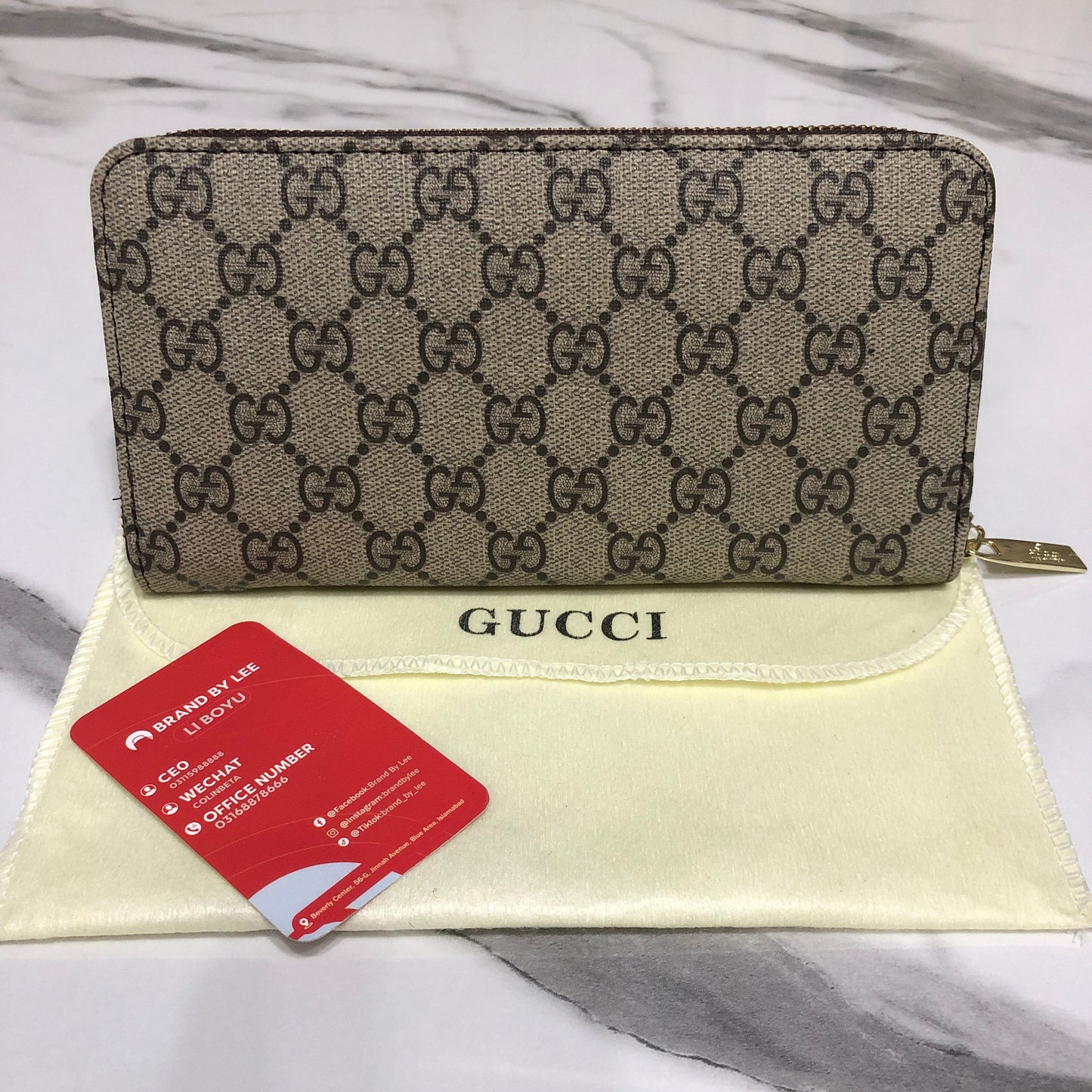 Gucci GG Supreme canvas zip-around wallet