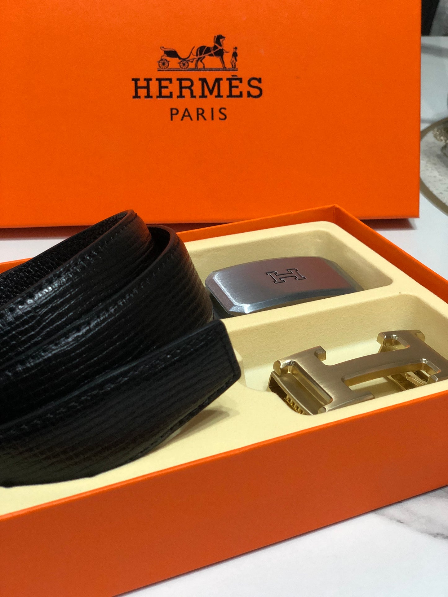 Hermès belt with two interchangeable H buckles