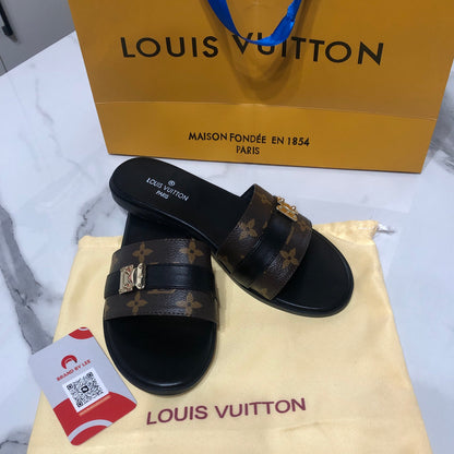 Louis Vuitton Lock It flat mules