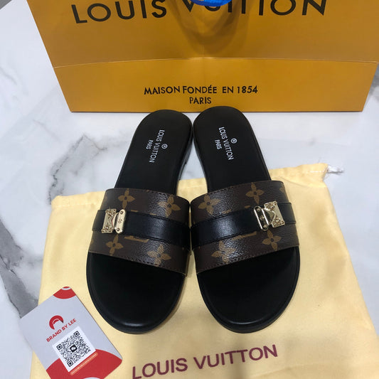 Louis Vuitton Lock It flat mules