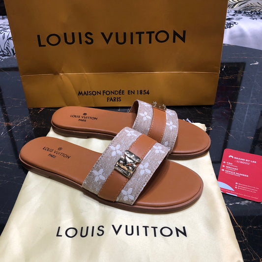 Louis Vuitton Lock It flat mules