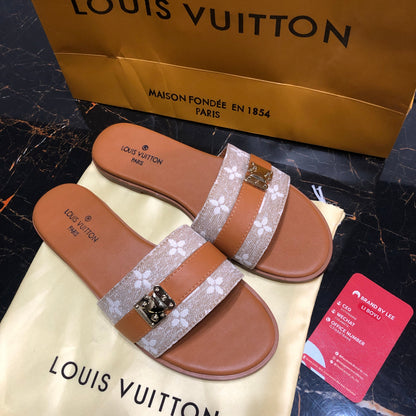 Louis Vuitton Lock It flat mules