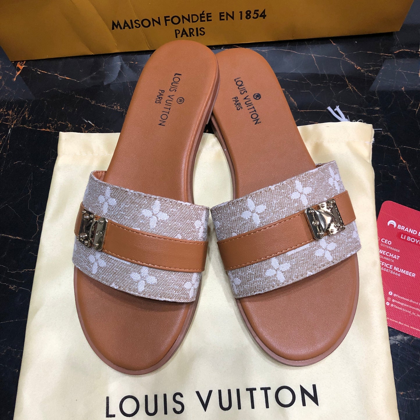 Louis Vuitton Lock It flat mules