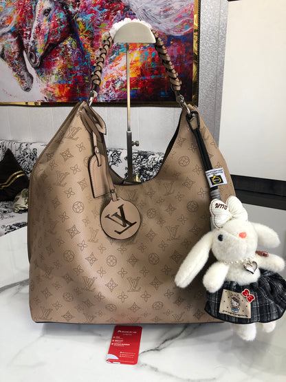 Louis Vuitton Carmel Hobo bag