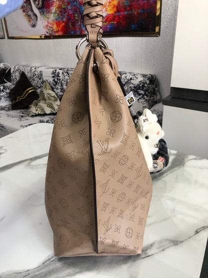 Louis Vuitton Carmel Hobo bag
