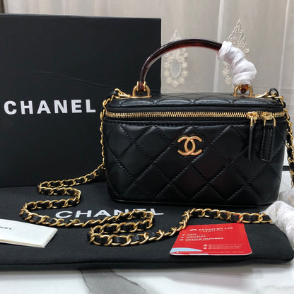 Chanel Quilted Lambskin Vanity Case with a top handle