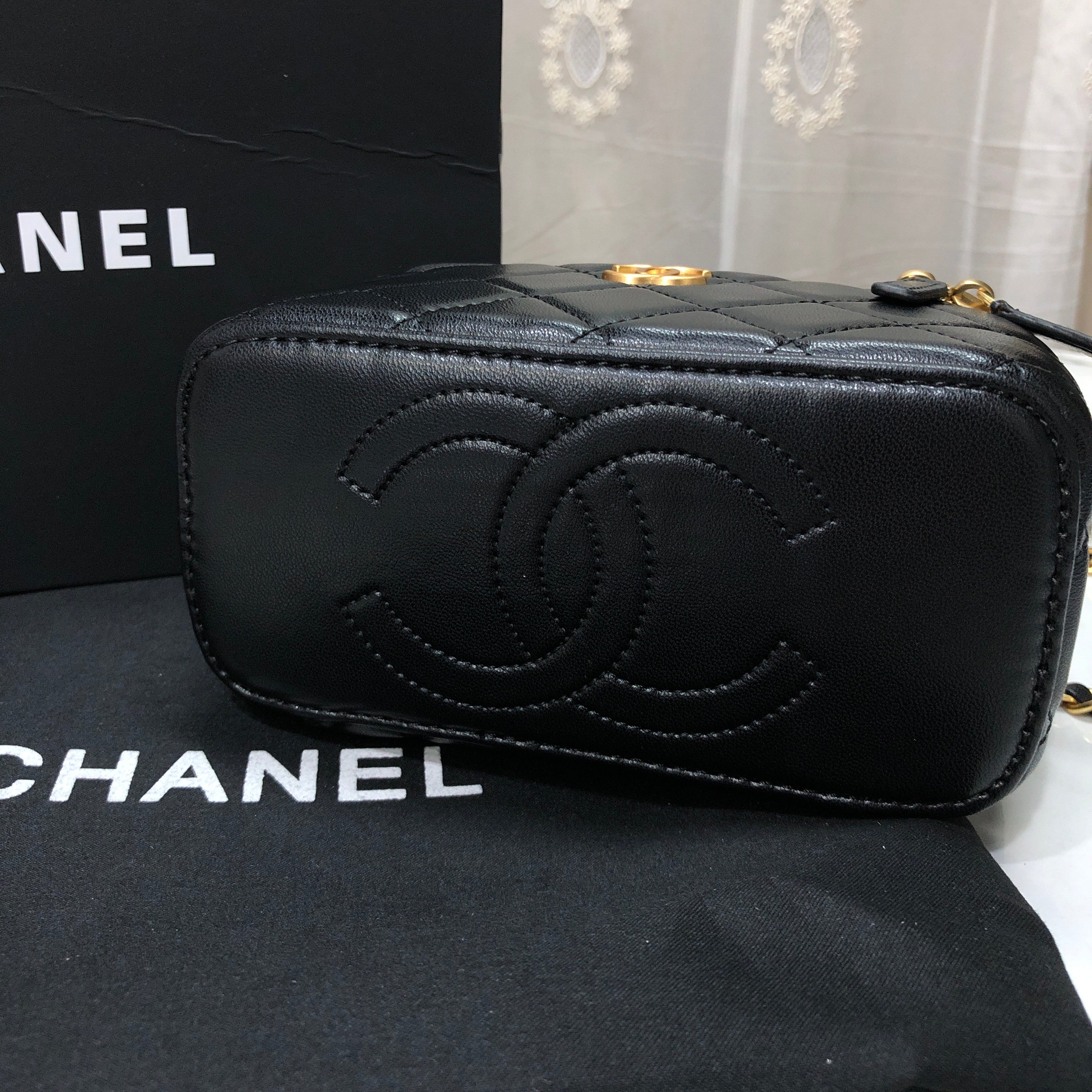 Chanel Quilted Lambskin Vanity Case with a top handle