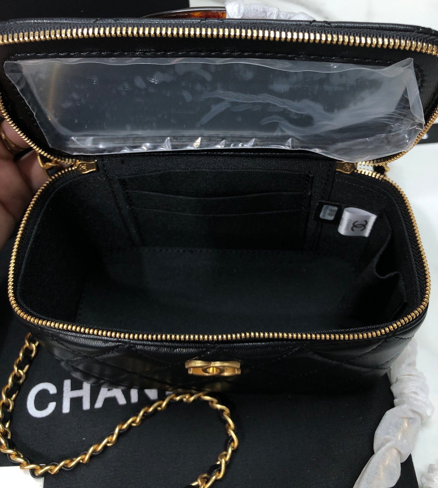 Chanel Quilted Lambskin Vanity Case with a top handle