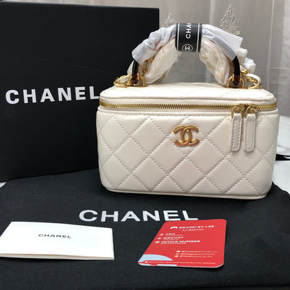 Chanel Quilted Lambskin Vanity Case with a top handle