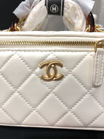 Chanel Quilted Lambskin Vanity Case with a top handle