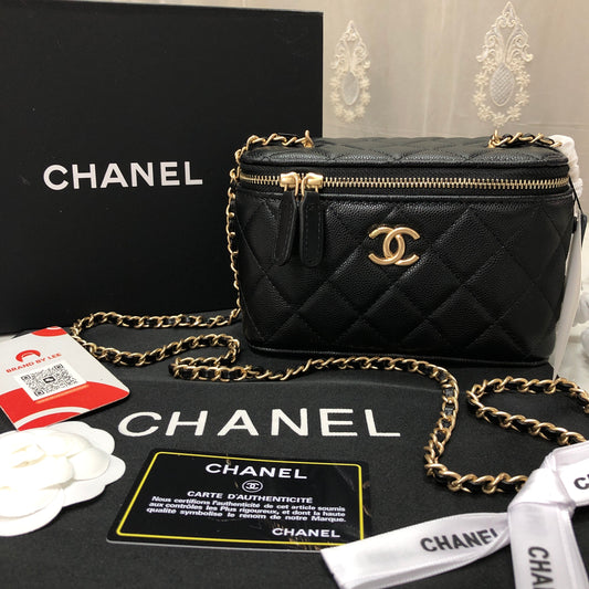 Chanel black caviar quilted vanity case