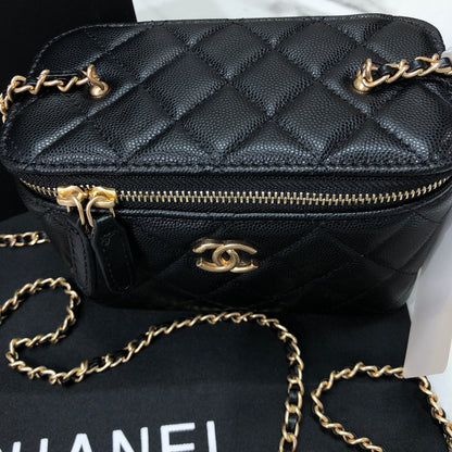Chanel black caviar quilted vanity case