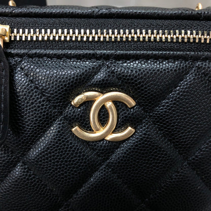 Chanel black caviar quilted vanity case