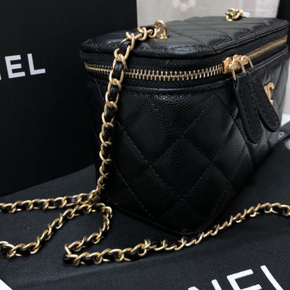 Chanel black caviar quilted vanity case