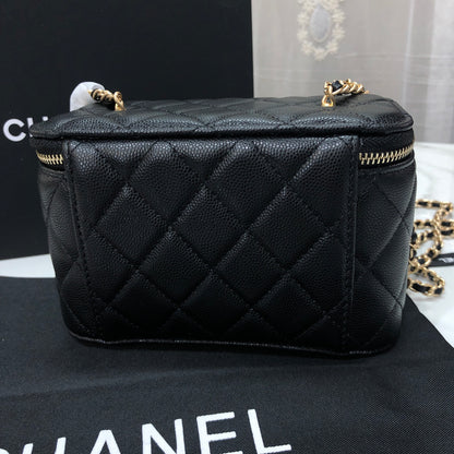 Chanel black caviar quilted vanity case