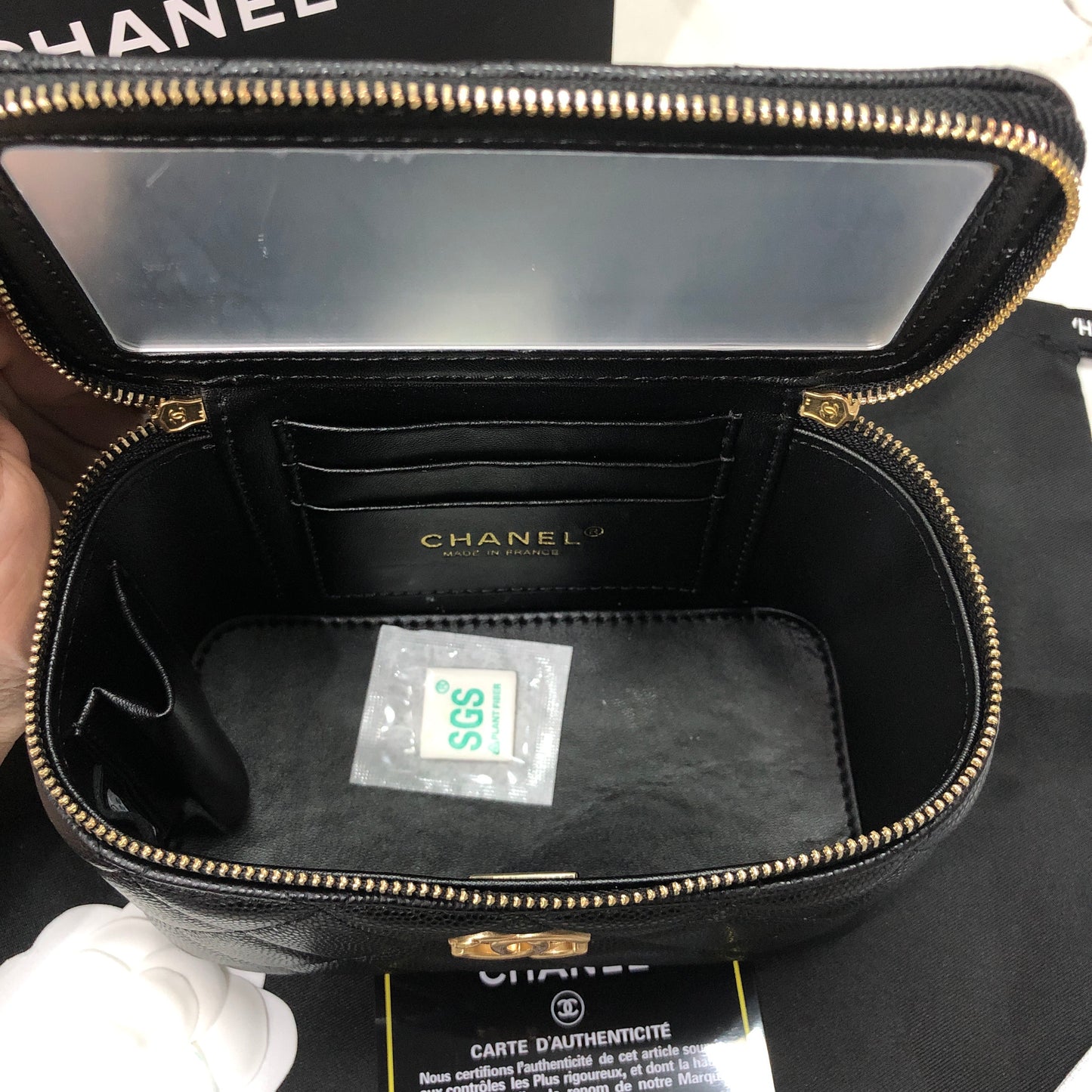 Chanel black caviar quilted vanity case