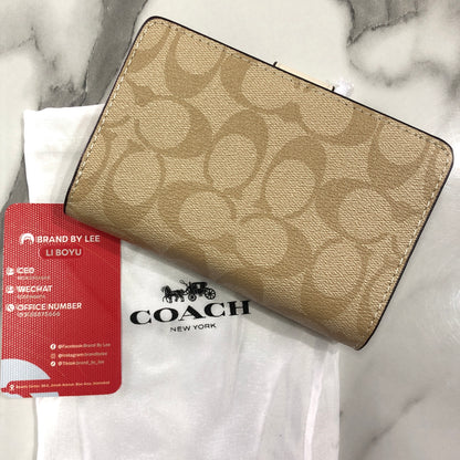 Coach Medium Corner Zip Wallet in Signature Canvas