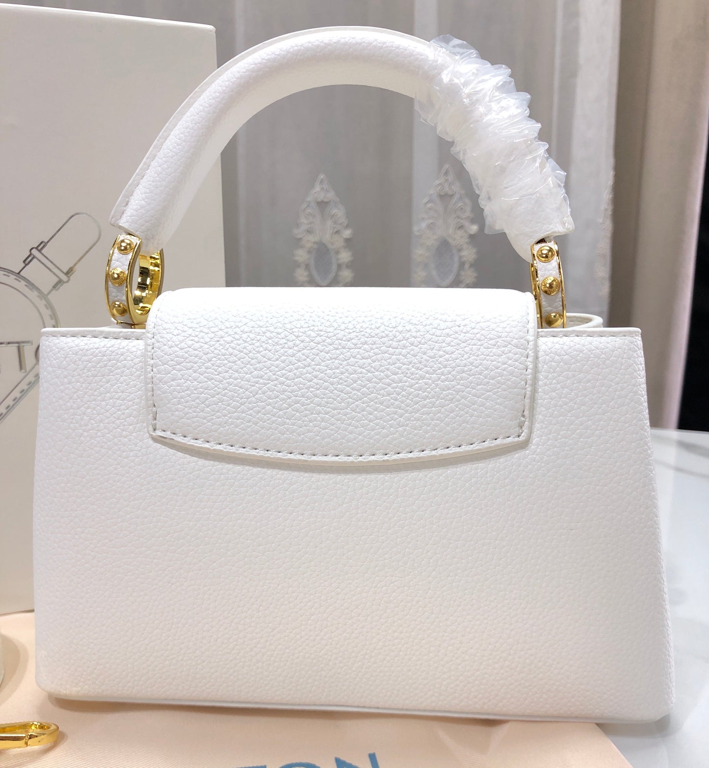 Louis Vuitton Capucines Mini Bag