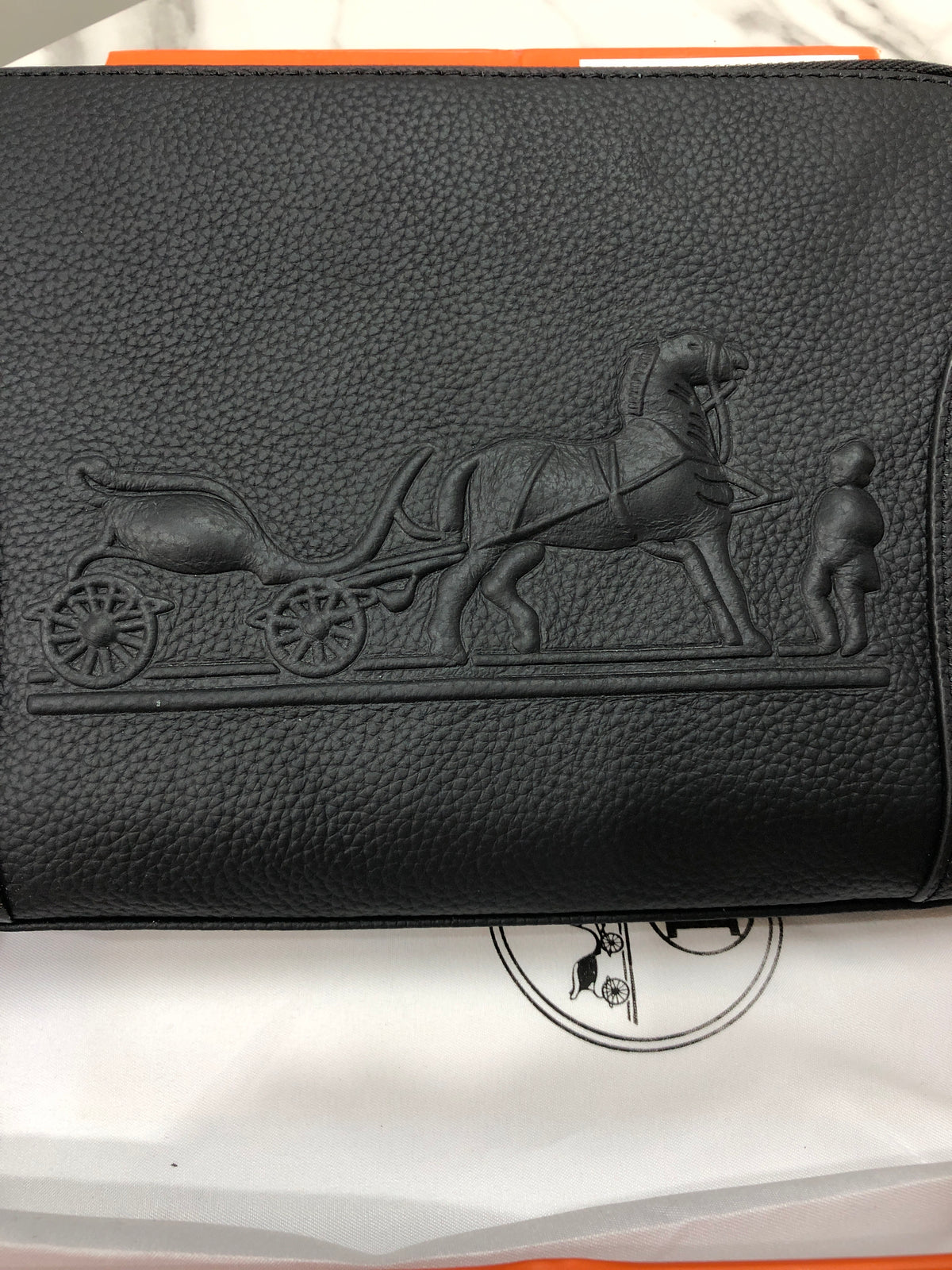 Black embossed horse and carriage leather zipper pouch