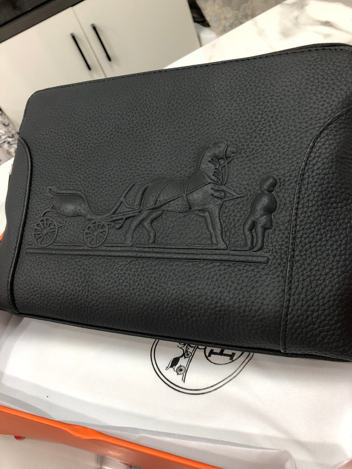 Black embossed horse and carriage leather zipper pouch