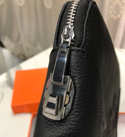 Black embossed horse and carriage leather zipper pouch